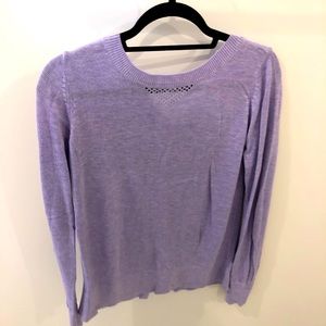 Size 6 Lululemon Athletica sweater with open back detail.